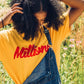 Millions Original 13' Tee | Gold/Red By Tyler Blake